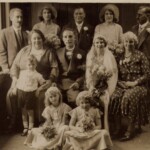 Wedding of Charles Henry Jacobs and Louisa Rayne - 22 August 1931 at St Clement Danes Church, London<br> Back: John Jacobs; Anne Rayne, Best man, Bridesmaid, Walter Guy Rayne<br/> <br>Seated: Catherine Jacobs nee Newman, Charles Henry Jacobs, Louisa Rayne, Louisa Elizabeth Rayne nee Sparks<br/> <br>Front: Denis John Lloyd Carver, Betty Fox, Bridesmaid<br/> <br>Photo courtesy of Lynda Kelly</br>